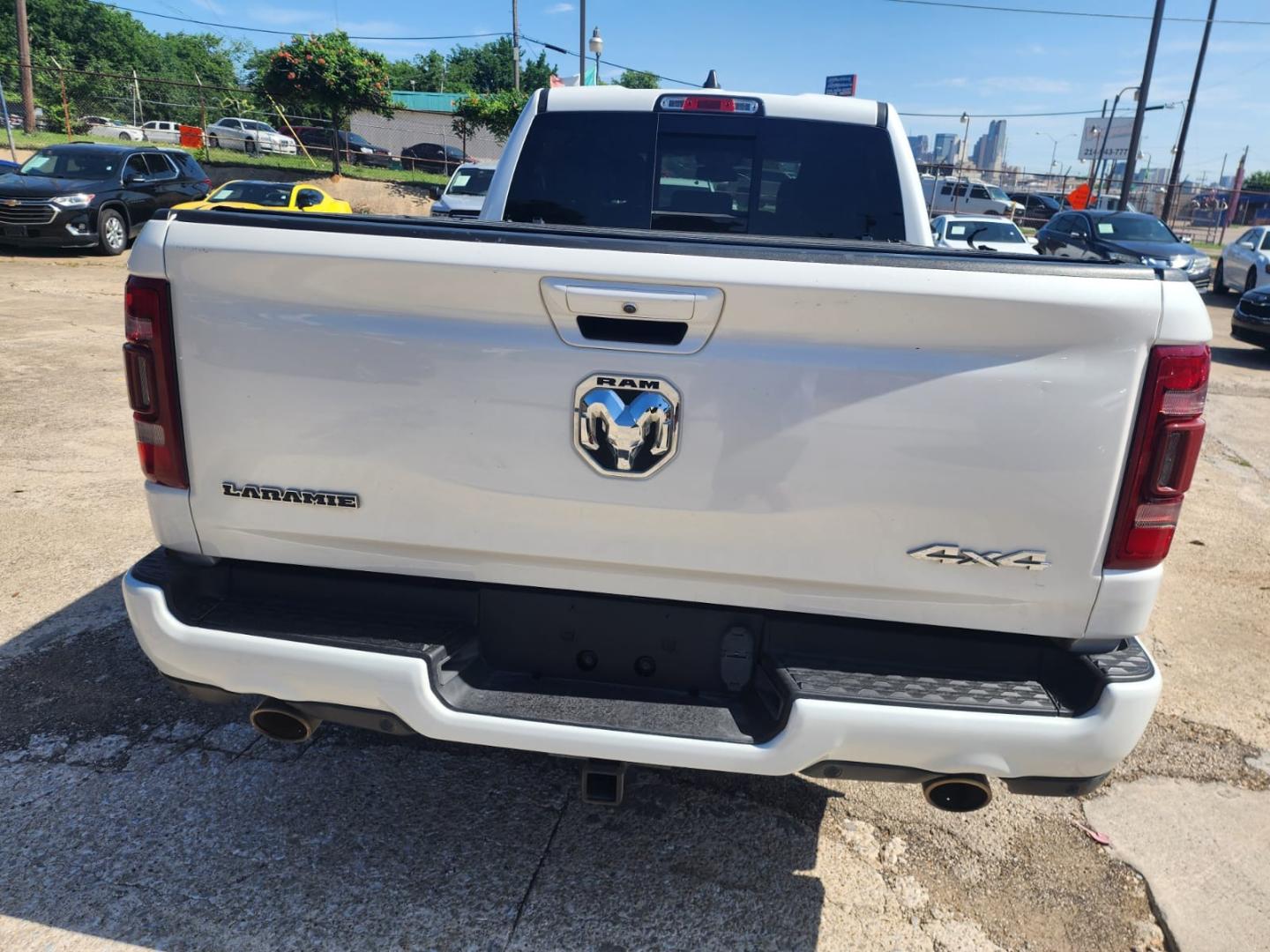 2019 white RAM 1500 Laramie Crew Cab LWB 4WD (1C6SRFRT3KN) with an 5.7L V8 OHV 16V engine, 8A transmission, located at 945 E. Jefferson Blvd, Dallas, TX, 75203, (214) 943-7777, 32.752514, -96.811630 - Photo#3